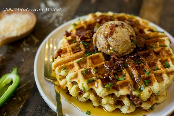 Close up photo of Parmesan Chive Waffles with maple cinnamon butter on top