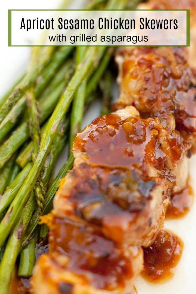 Apricot Sesame Chicken Skewers with Grilled Asparagus on white plate