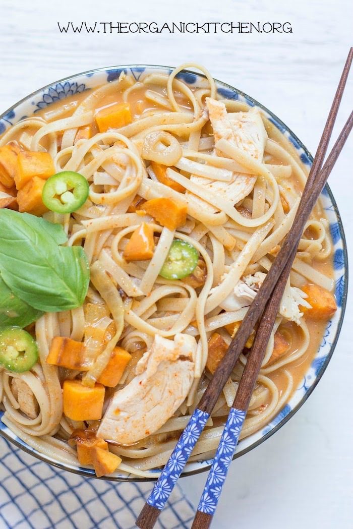 Chicken and Sweet Potato Asian Noodle Soup Chicken and Sweet Potato Asian Noodle Soup in blue and white bowl with chopsticks resting on top