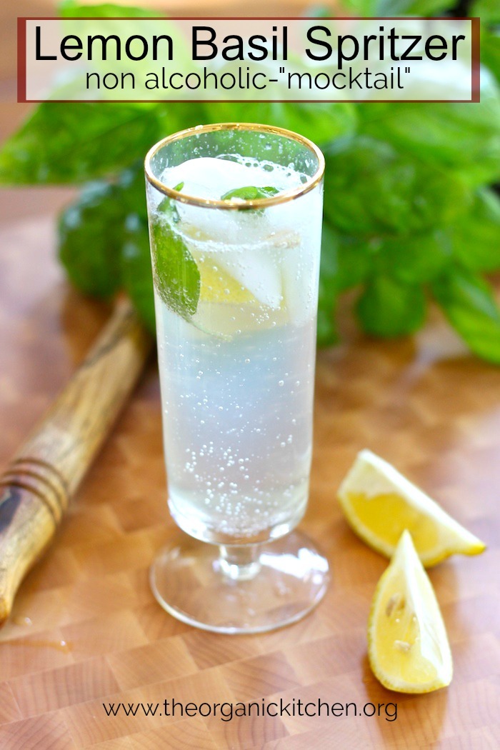 Lemon Basil Spritzer~ Non Alcoholic "Mocktail"  in a tall glass on a cutting board