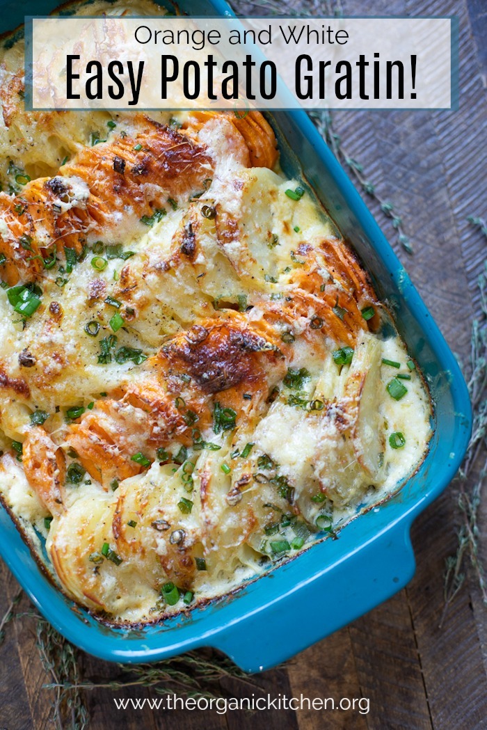 Orange and White Easy Potato Gratin in a blue baking dish on wooden table