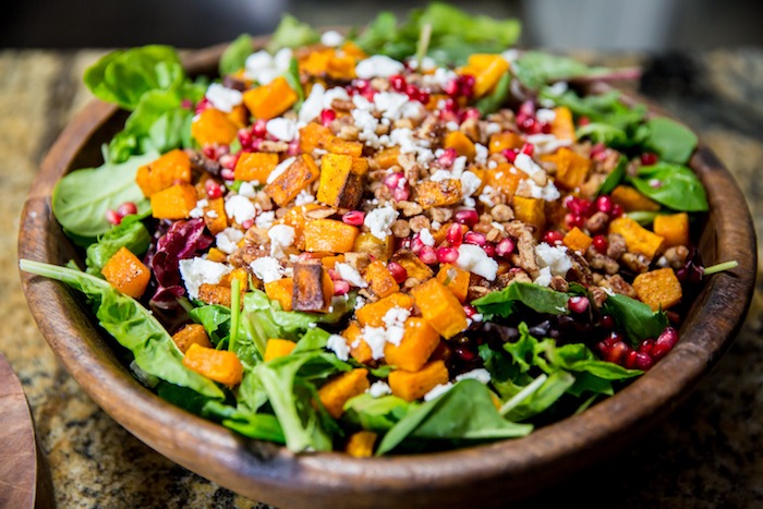 Greens with Butternut Squash and Pomegranate Vinaigrette! #butternutsquash #salad #glutenfree #pomegranatevinaigrette #sundanceutah