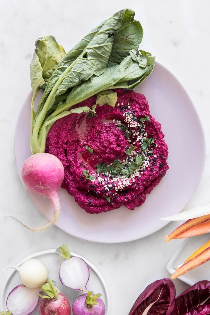 A white bowl with bright pink dip as part of 20+ Whole30 Dips, Sauces and Salad Dressings!