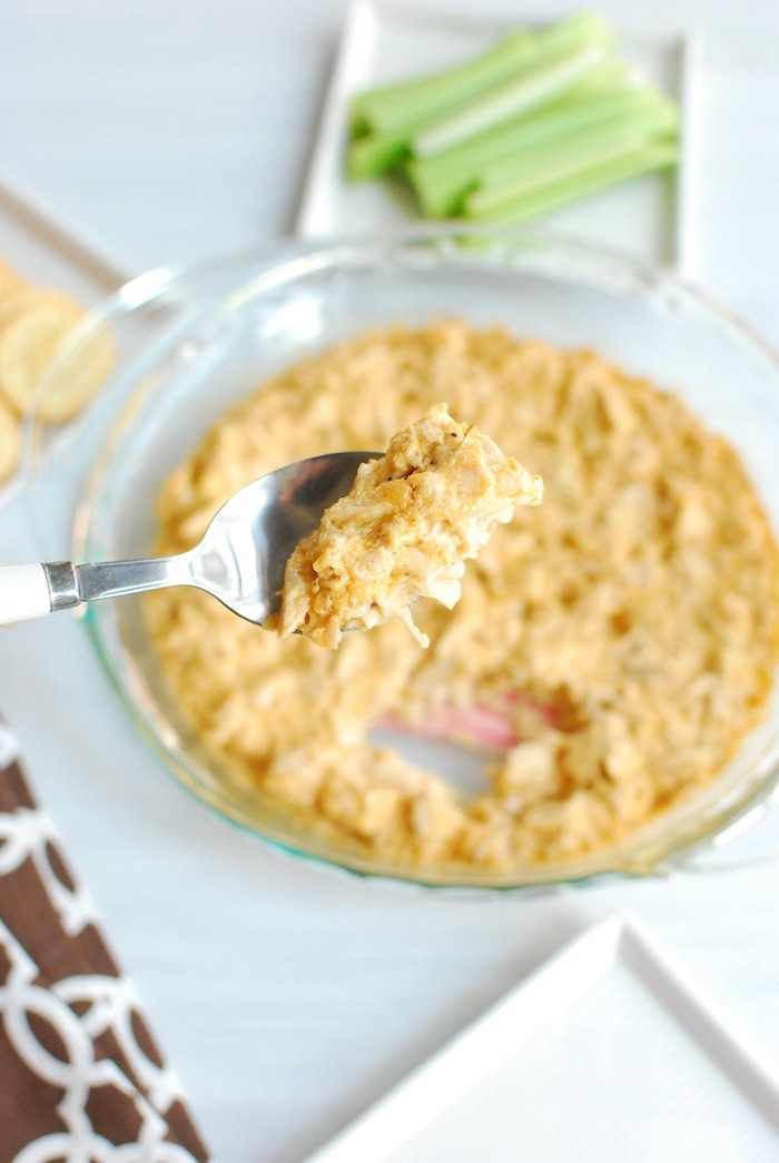 Buffalo dip in a bowl and on a spoon as part of 20+ Whole30 Dips, Sauces and Salad Dressings! 