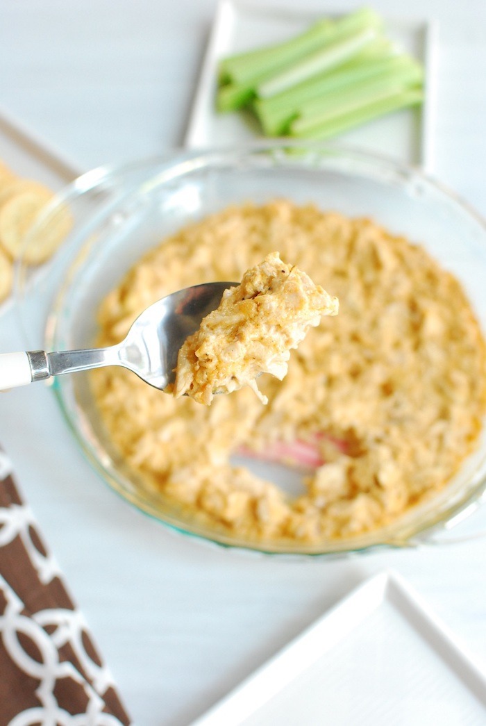 Buffalo dip in a bowl and on a spoon as part of 20+ Whole30 Dips, Sauces and Salad Dressings! 