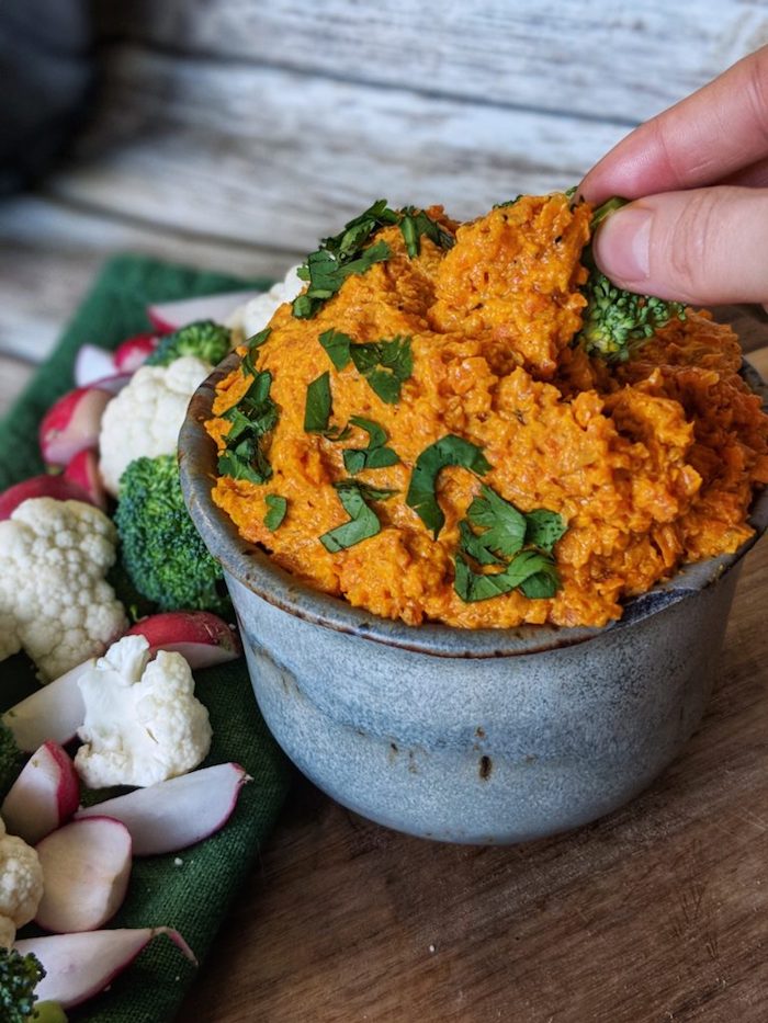 A bowl full or dip surrounded by vegetables as part of 20+ Whole30 Dips, Sauces and Salad Dressings! 