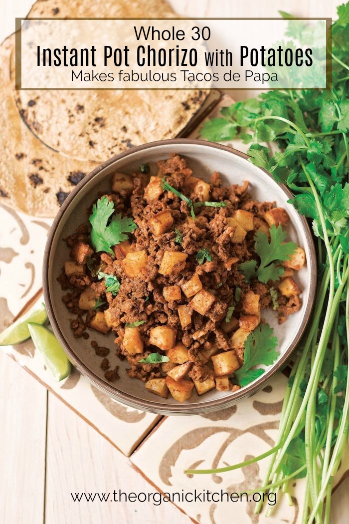 Instant Pot Chorizo with Potatoes! in white bowl surrounded by parsley and tortillas