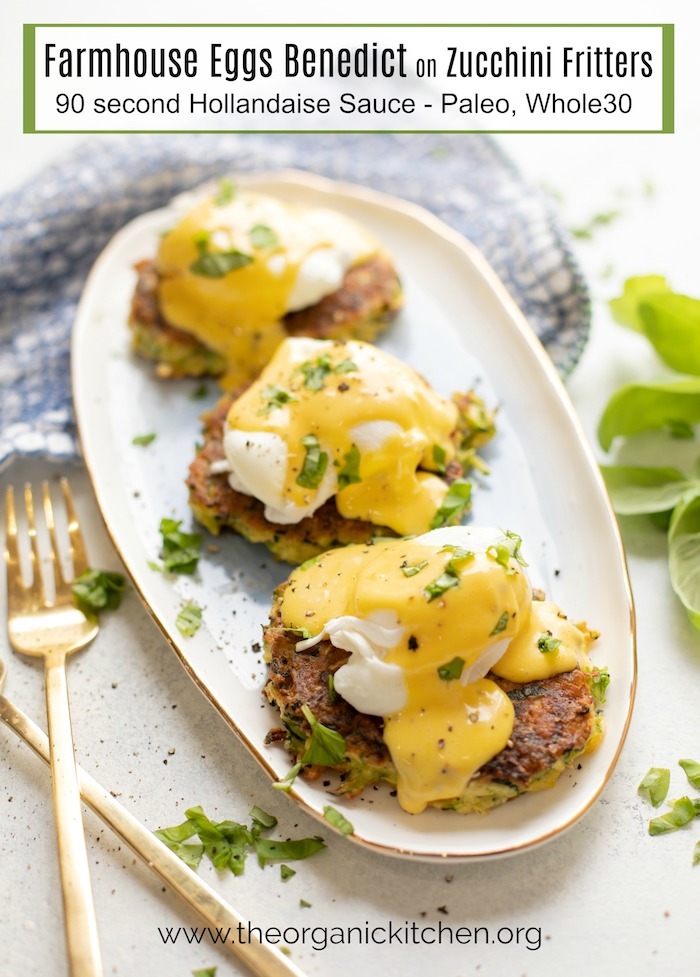 Farmhouse Eggs Benedict on Zucchini Fritters! (Paleo-Whole30 option) on white plate with gold fork