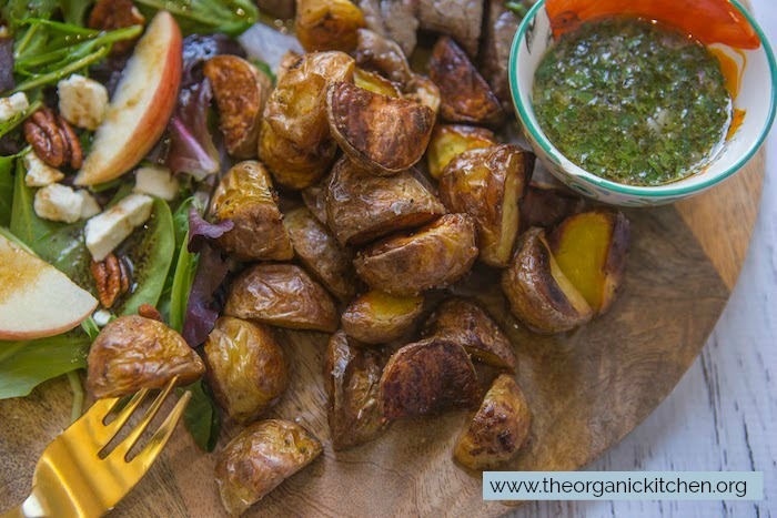 A close up of the crispy potatoes on the Chimichurri Steak, Potato and Salad Board 