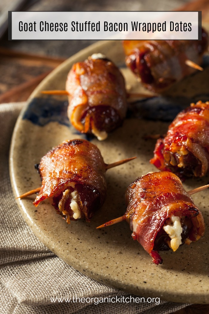 Goat Cheese Stuffed Bacon Wrapped Dates skewered with toothpicks and displayed on a plate