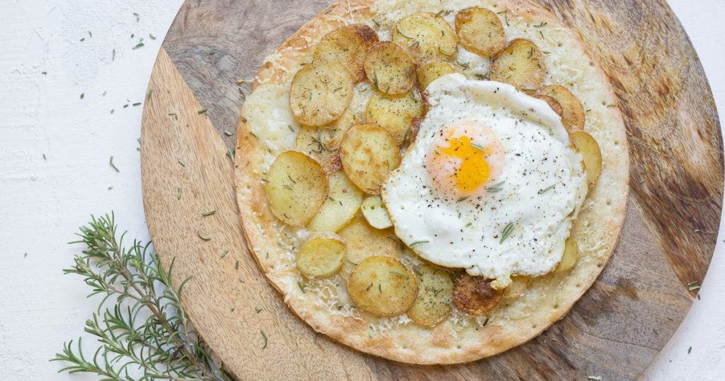 Rosemary Potato Flatbread Rosemary Potato Flatbread on cutting board
