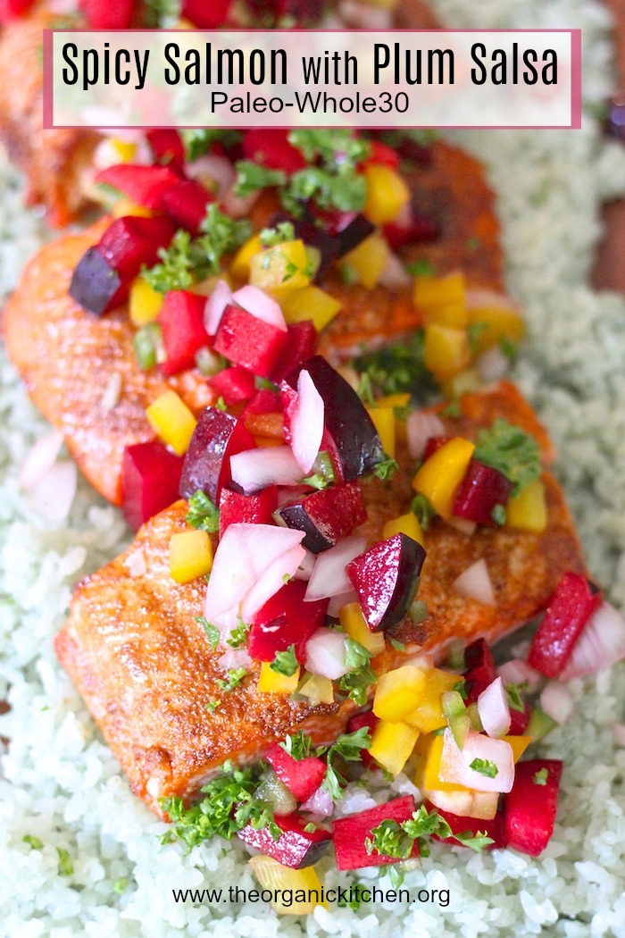 Brightly colored Spicy Salmon with Plum Salsa on a bed of cauliflower rice