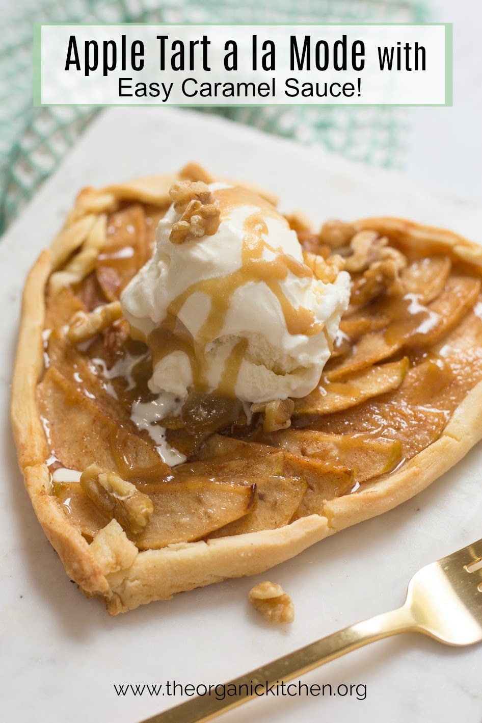 Apple Tart a la Mode with easy Caramel Sauce on marble platter with gold fork in the foreground