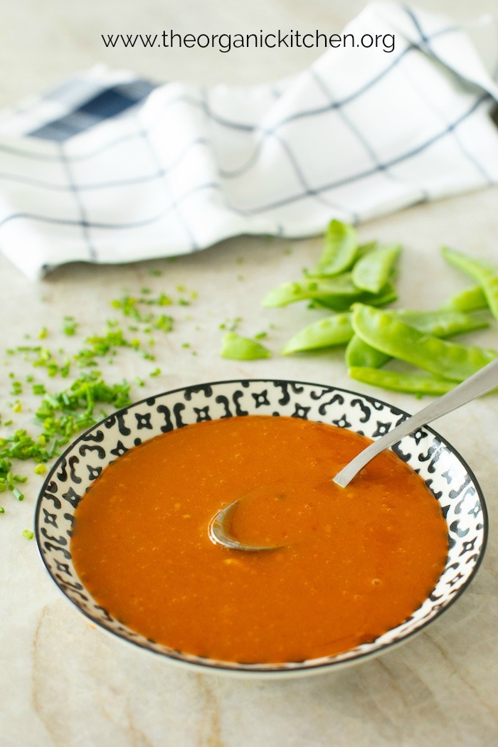 A small bowl of sweet and spicy sauce used for Thai Beef and Broccoli Rice Bowl