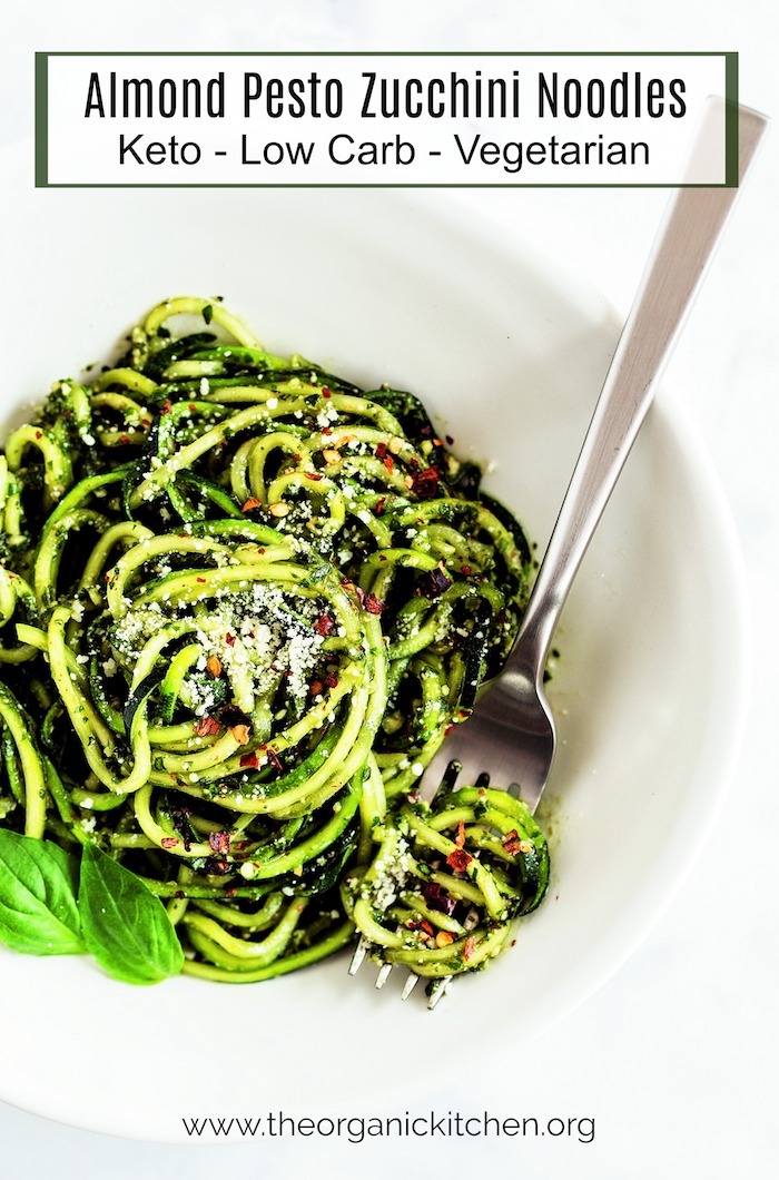 Almond Pesto Zucchini Noodles in white bowl with silver fork