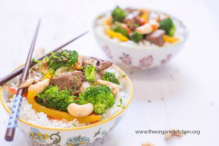 Two bowls of Thai Beef and Broccoli Rice Bowl with chop sticks