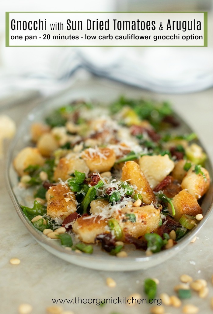 Gnocchi with Sun Dried Tomatoes and Baby Arugula! (Low Carb-Keto Option!) on gray platter