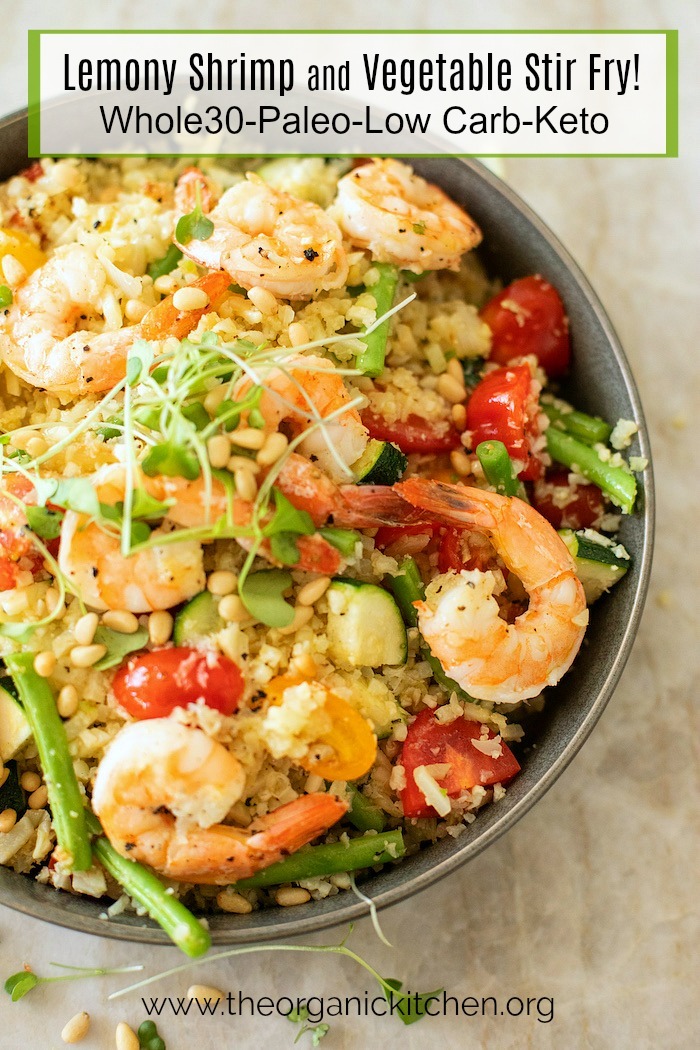 Lemony Shrimp and Vegetable Stir Fry Bowl set on marble surface