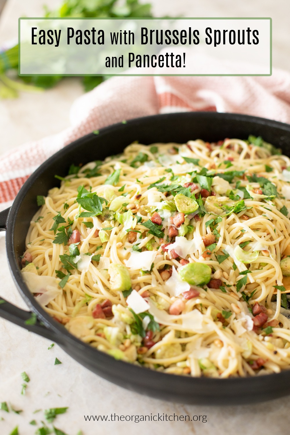 A black cast iron skillet filled with Pasta with Brussels Sprouts and Pancetta