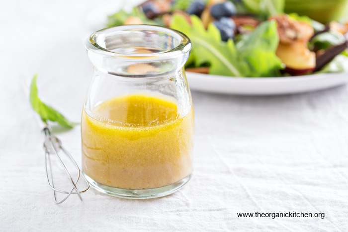 Honey Vinaigrette in a small jar for use on Grilled Apricot and Blueberry Salad