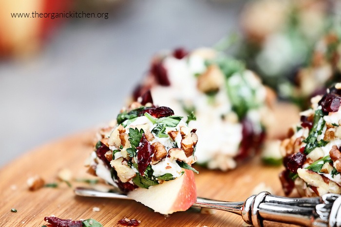 Cranberry Nut Cheeseball spread on sliced apples