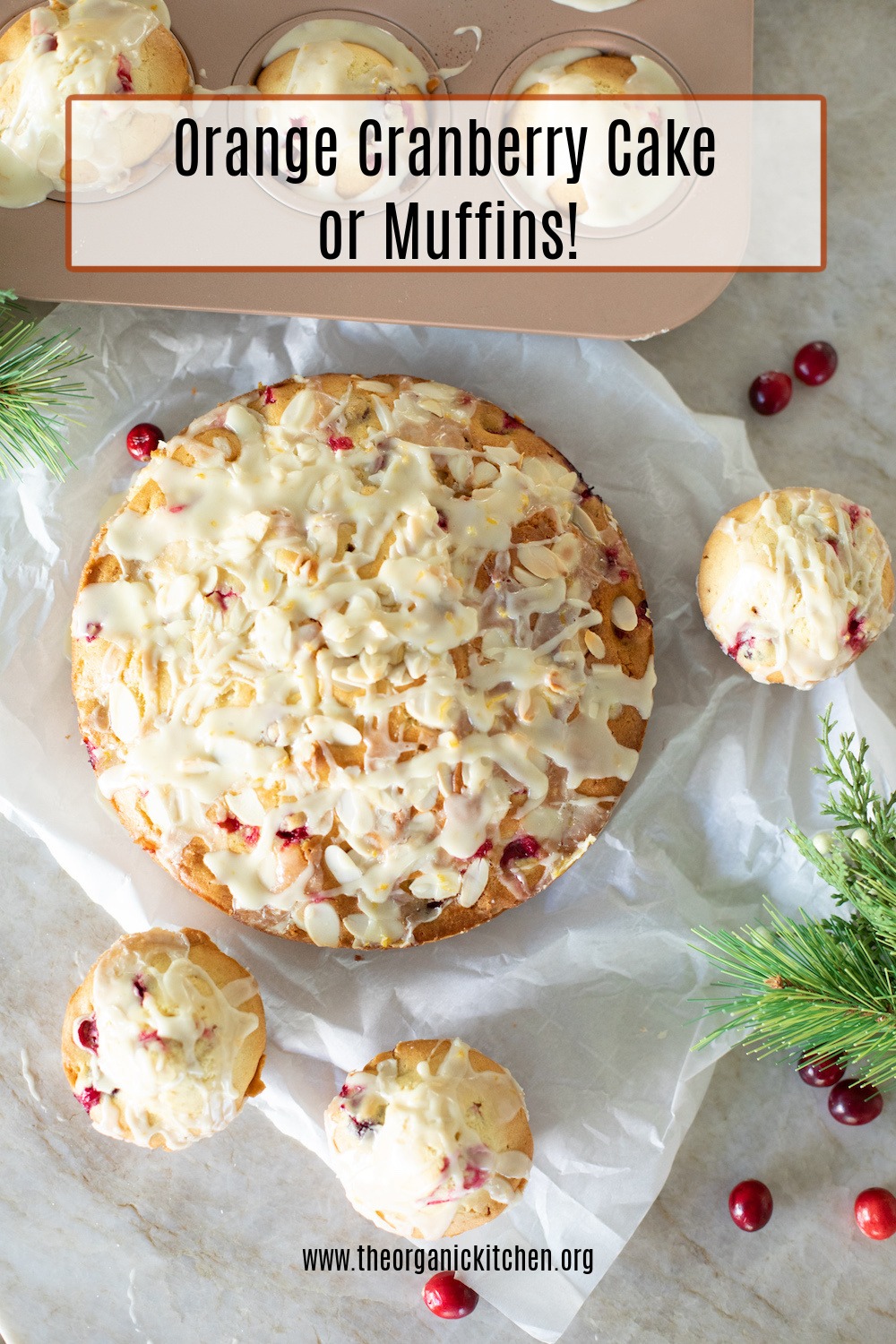 Orange Cranberry Cake and Muffins surrounded by cranberries and holiday greenery