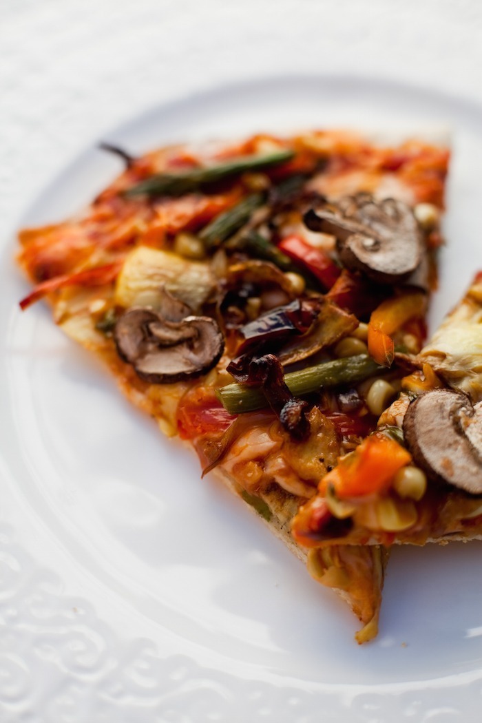 Two pieces of Grilled Veggie Pizza