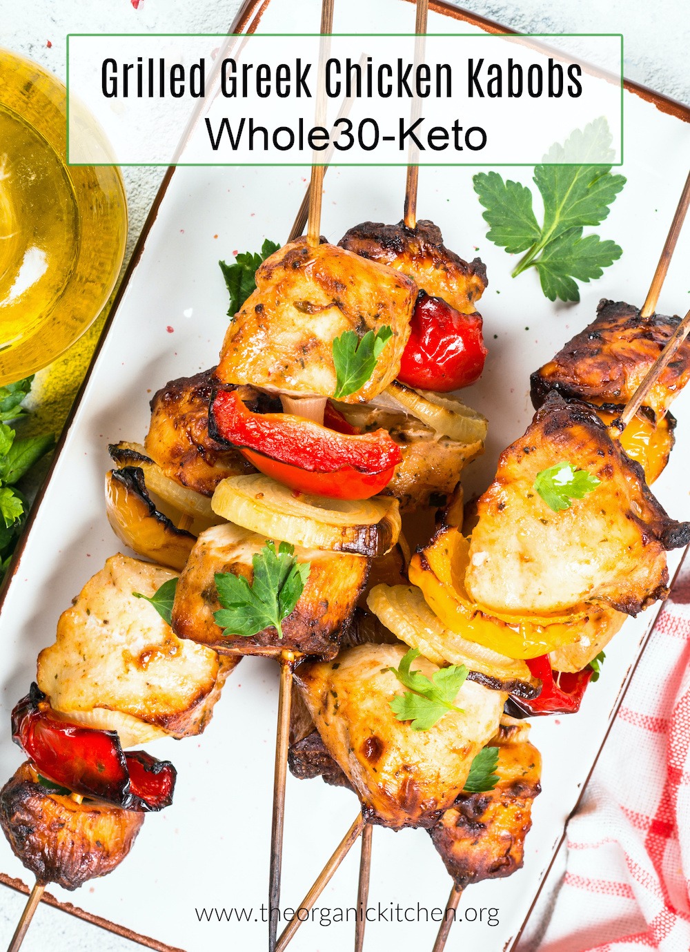 Grilled Greek Chicken Kabobs (Whole30-Keto)garnished with parsley on white plate 
