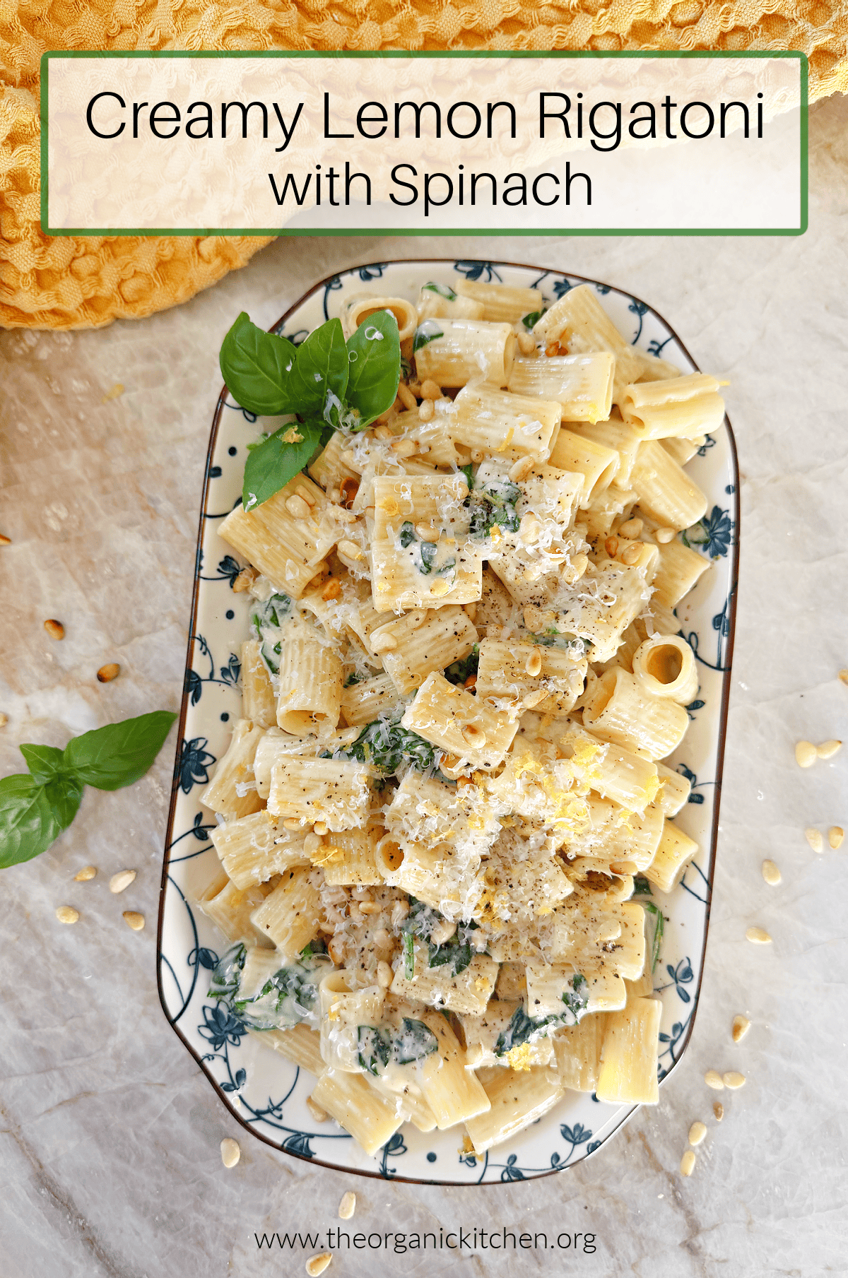 Creamy Lemon Rigatoni with Spinach Creamy Lemon Rigatoni with Spinach on blue and white platter set on marble counter