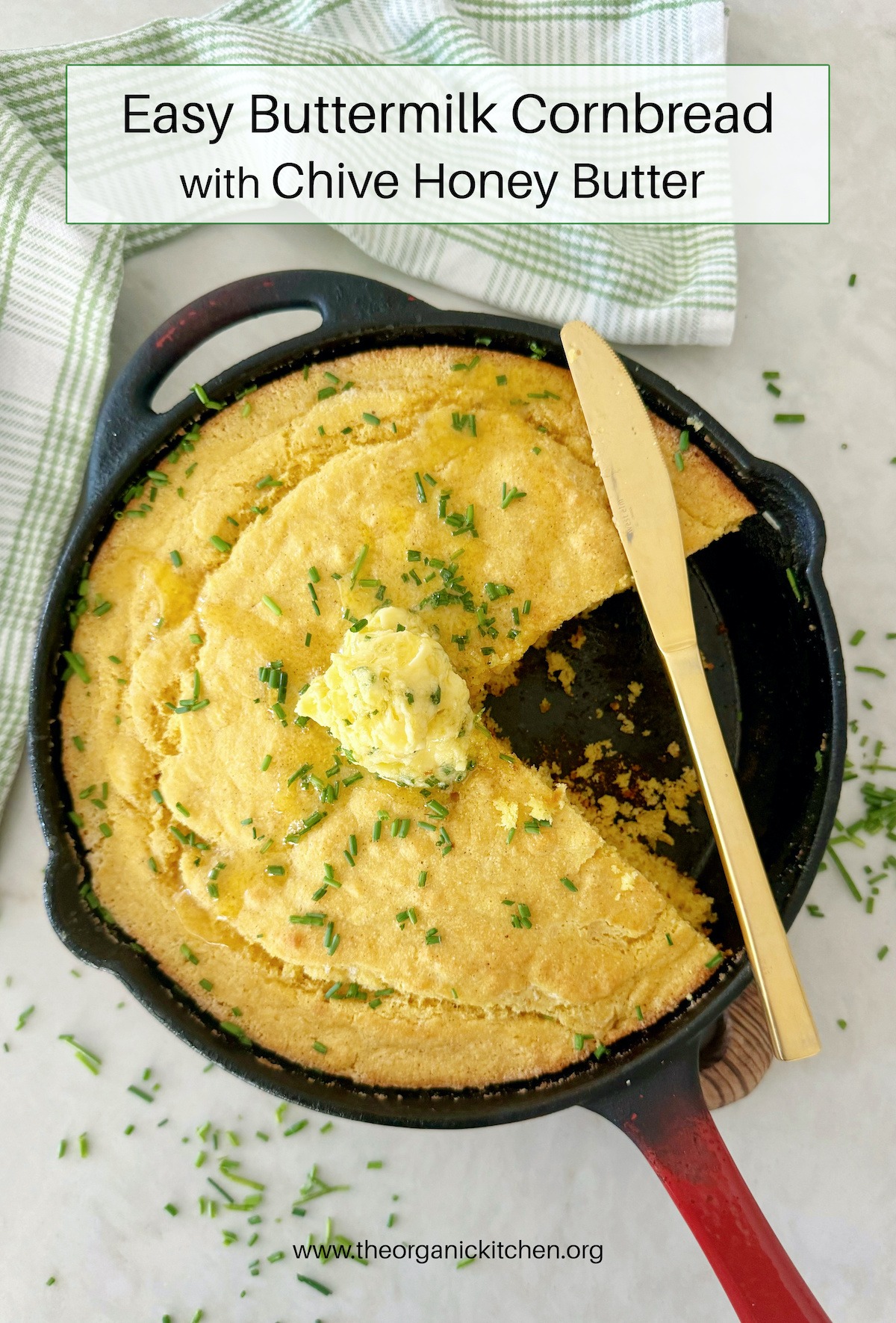 Buttermilk Cornbread with Chive Honey Butter in black skillet with red handle