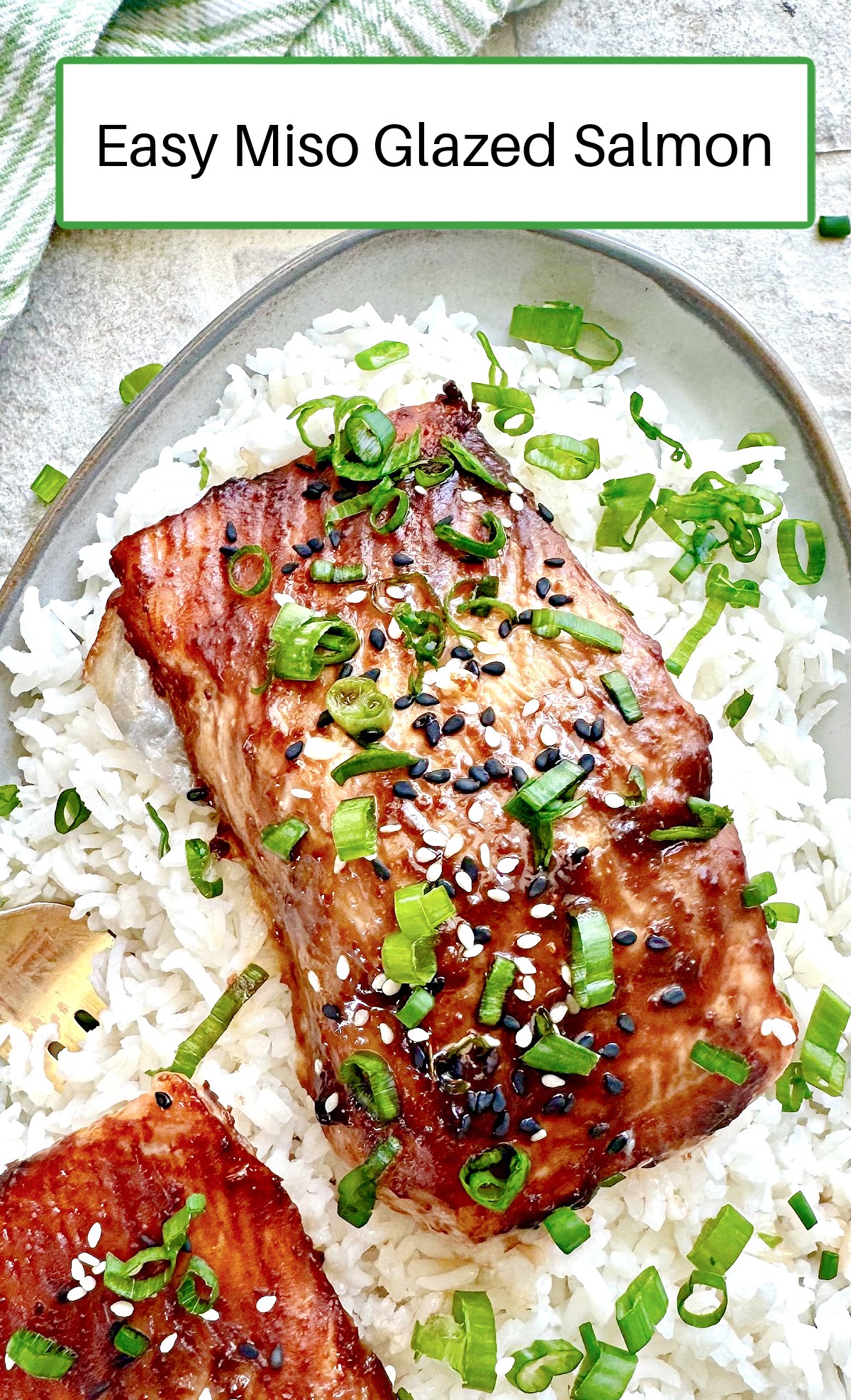 Easy Miso Glazed Salmon on a bed of white rice on grey plate