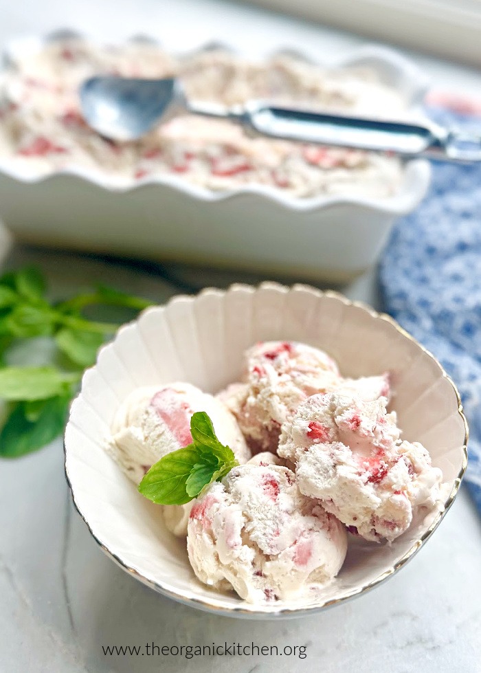 A bowl and dish filled with homemade Strawberry No Churn Ice Cream as part of a collection: Five "No Churn" Ice Cream Recipes