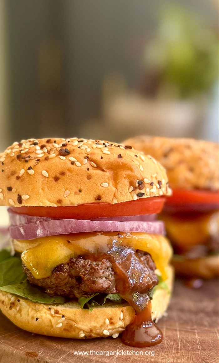 Maple BBQ Cheeseburger dripping with BBQ sauce and melted cheese