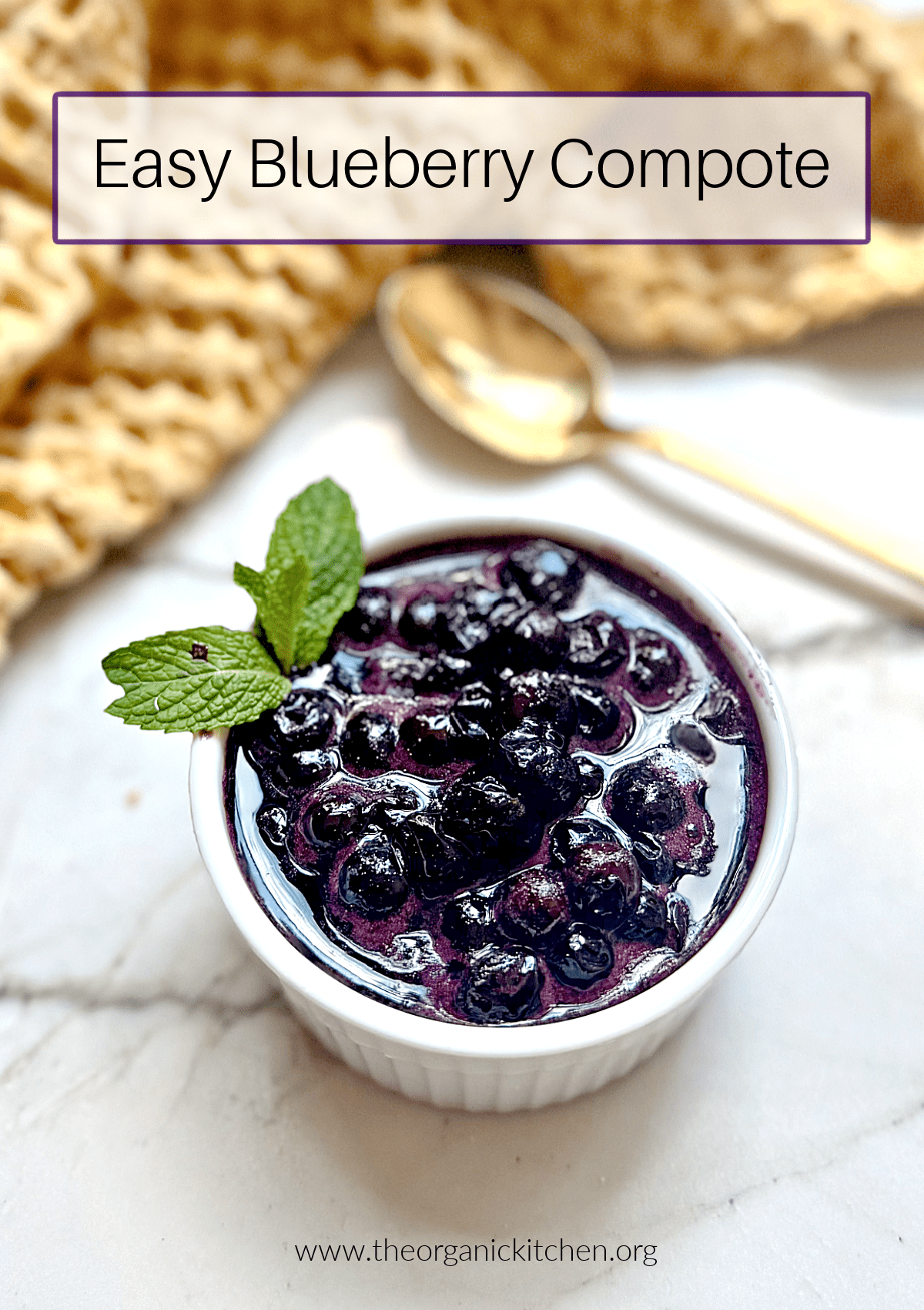 Easy Blueberry Compote Easy Blueberry Compote in a small white bowl on white marble counter with yellow dish towle and spoon in background