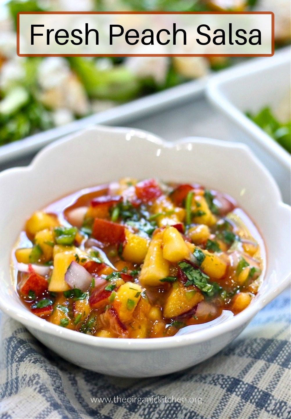 Fresh Peach Salsa Fresh Peach Salsa in white bowl with a green salad in the background
