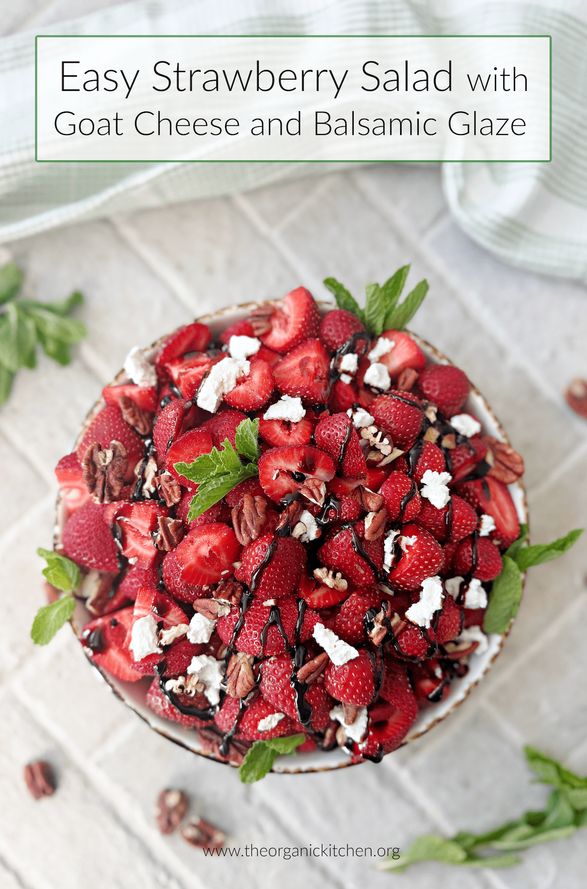 Easy Strawberry Goat Cheese Salad Easy Strawberry Goat Cheese Salad garnished with mint in a green bowl