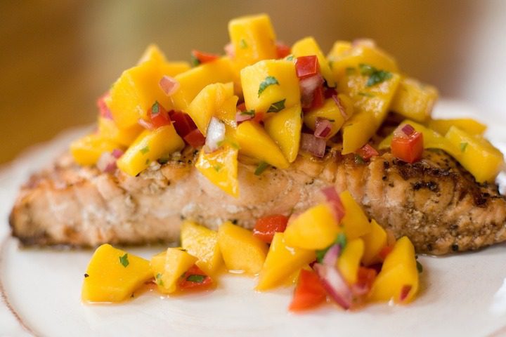 Tropical salmon on white plate/