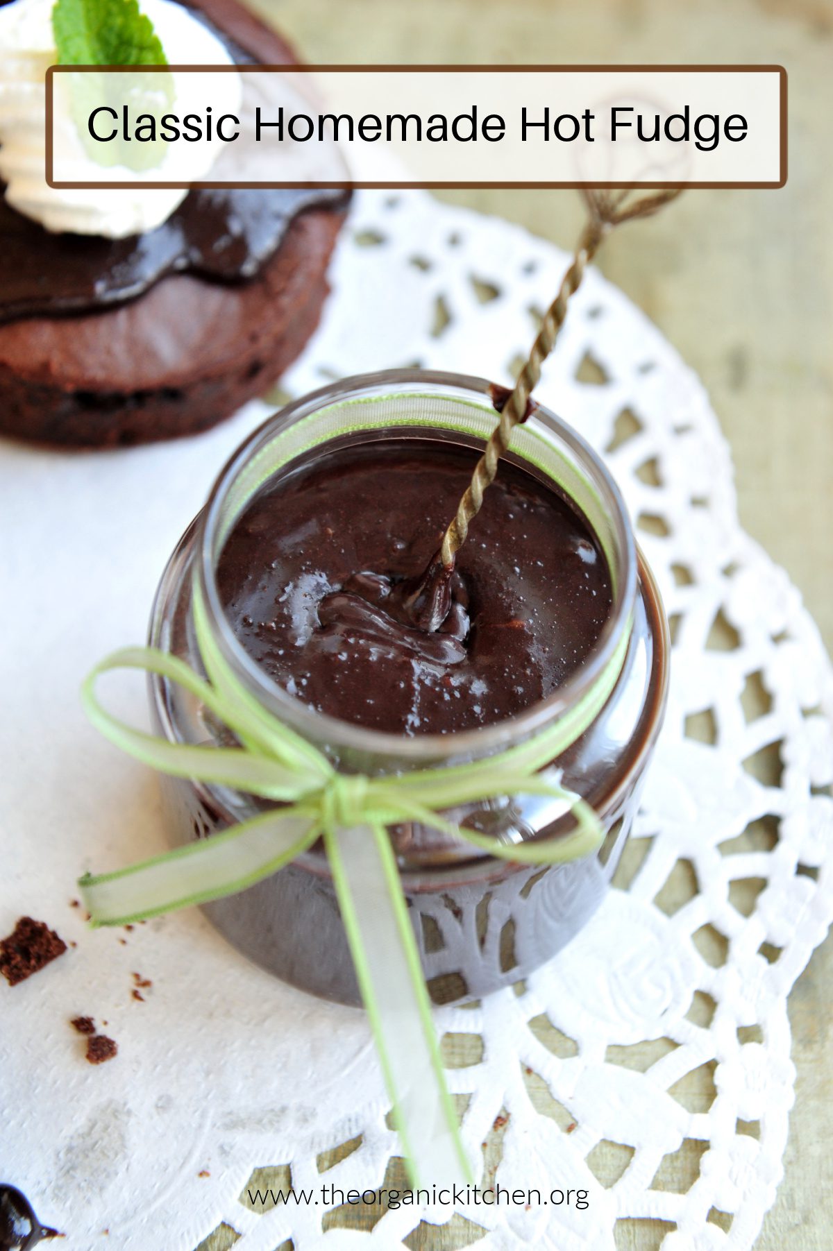 Classic Homemade Hot Fudge A mason jar with a green ribbon filled with Classic Homemade Hot Fudge