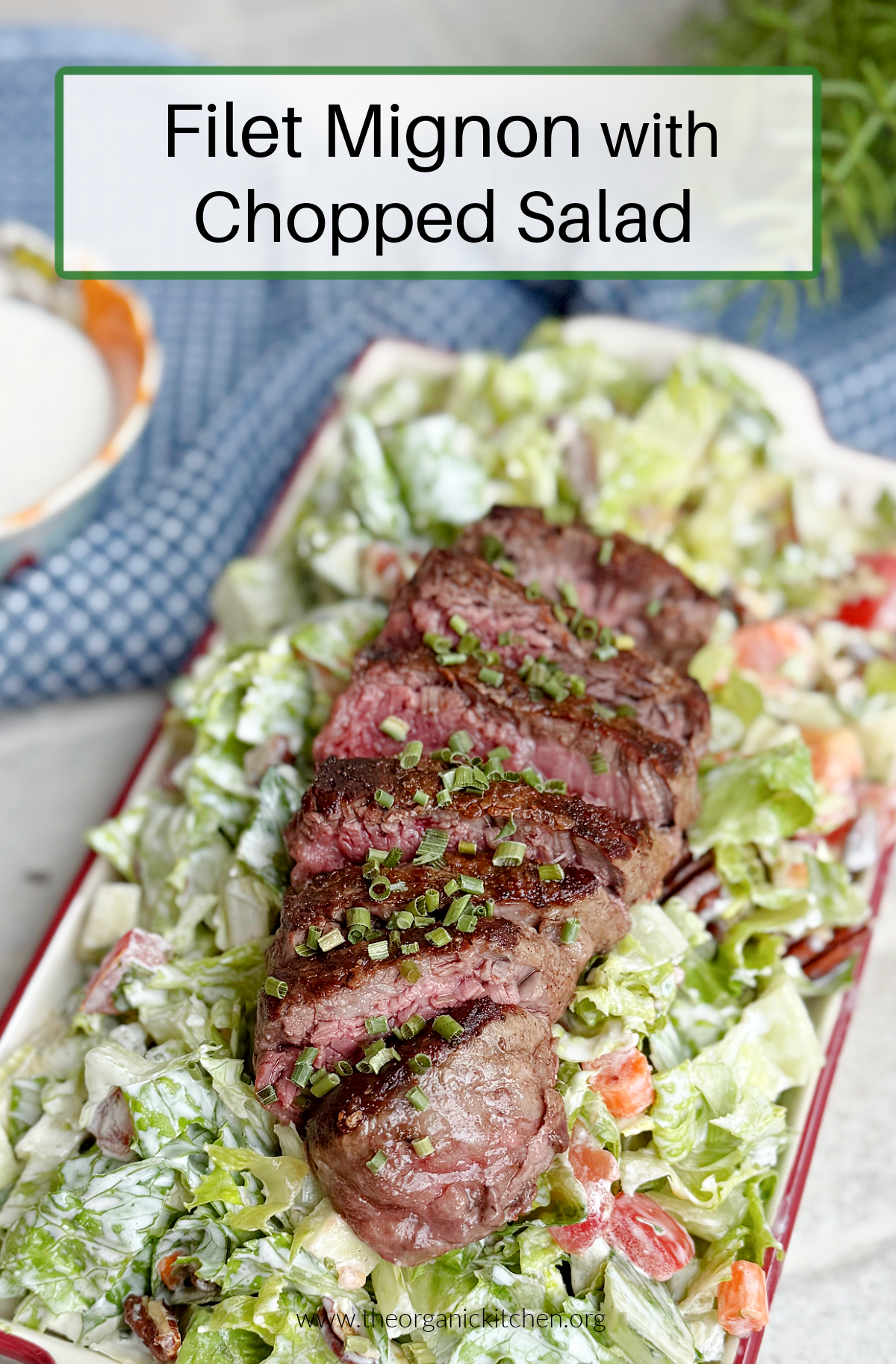 Filet Mignon with Chopped Salad on small plate with blue dish towel in the background